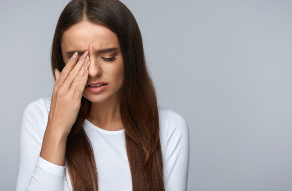 A woman dealing with eye pain