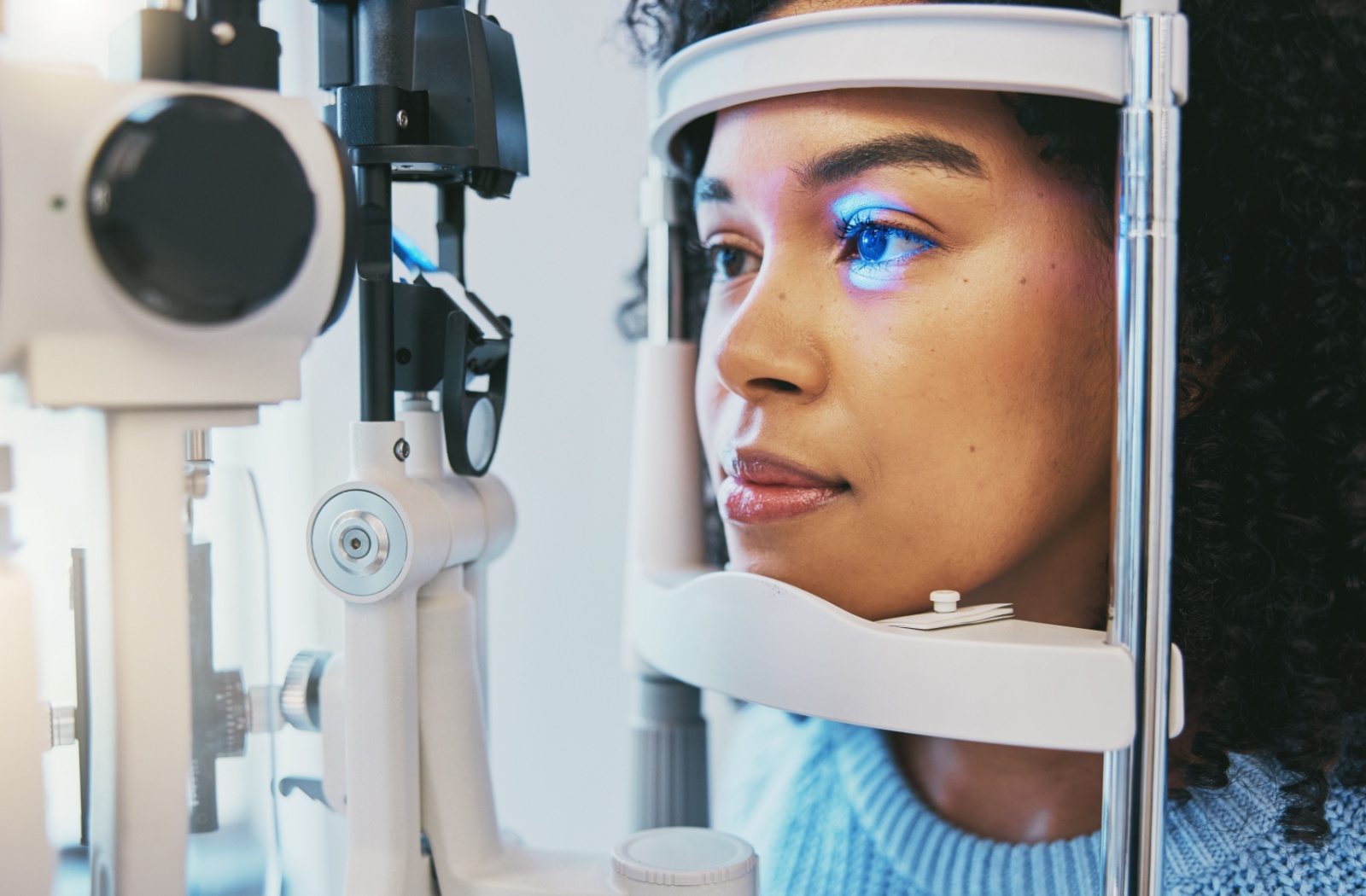 A woman undergoes an eye exam.